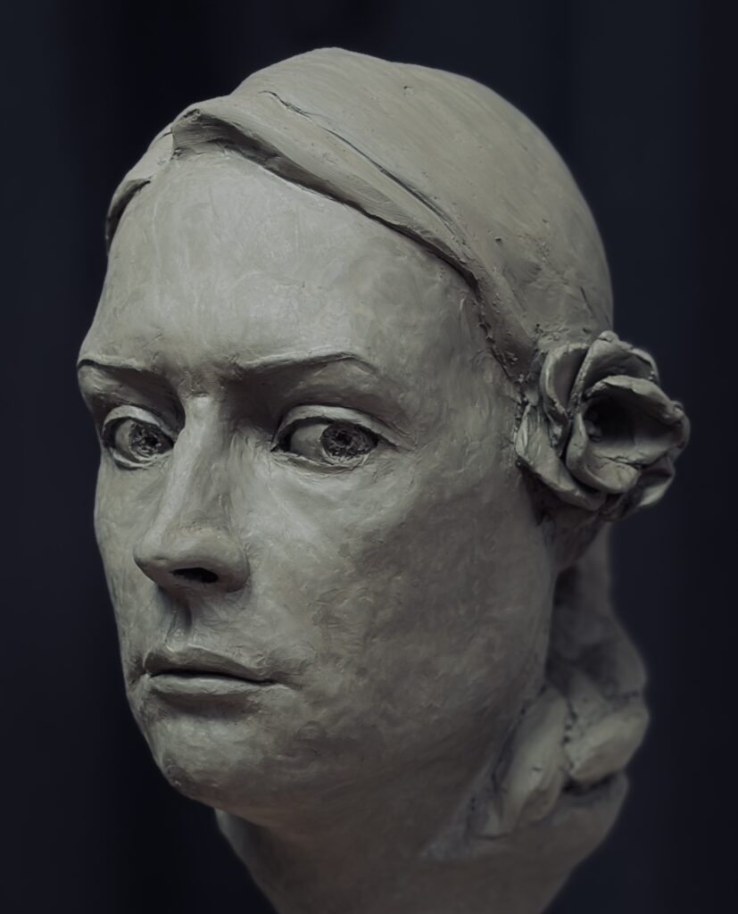 Close-up of Portrait of Tanya, clay sculpture by Vasil Hajigrudev